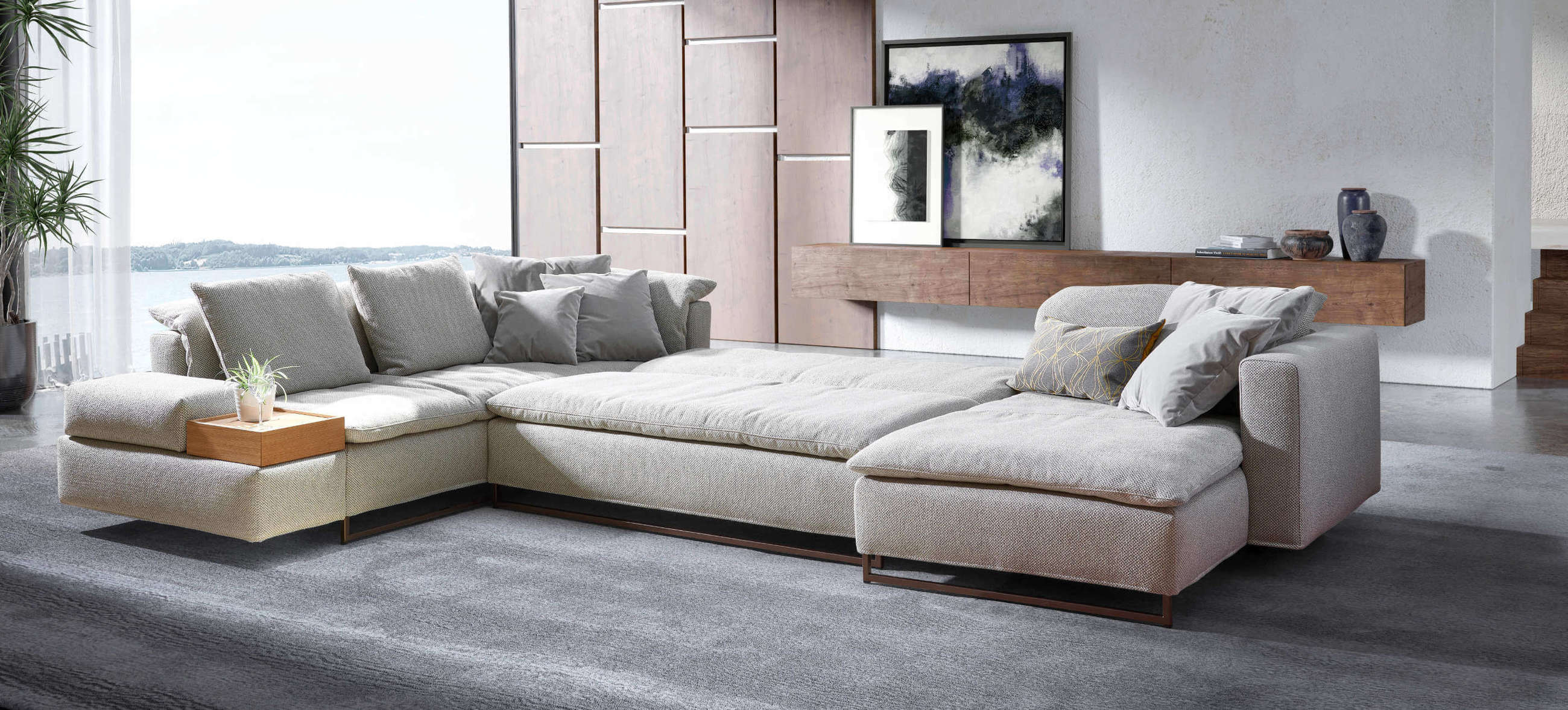 Großes Isla Ecksofa von Signet – Stilvolles Schlafsofa für modernes Wohnen Isla Ecksofa von Signet, ausgeklappt als Schlafsofa mit großzügiger Liegefläche, abgebildet in einem modernen Wohnzimmer.