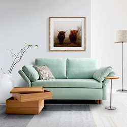 Das Schlafsofa Paula von Signet im Stoff Lesa, Farbe mint.