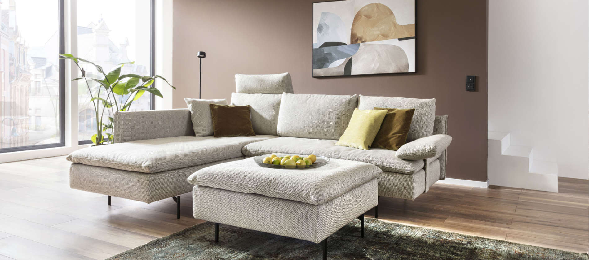 Signet Ecksofa Giro Ecksofa Giro von Signet mit drehbaren Loungchair und Hocker.