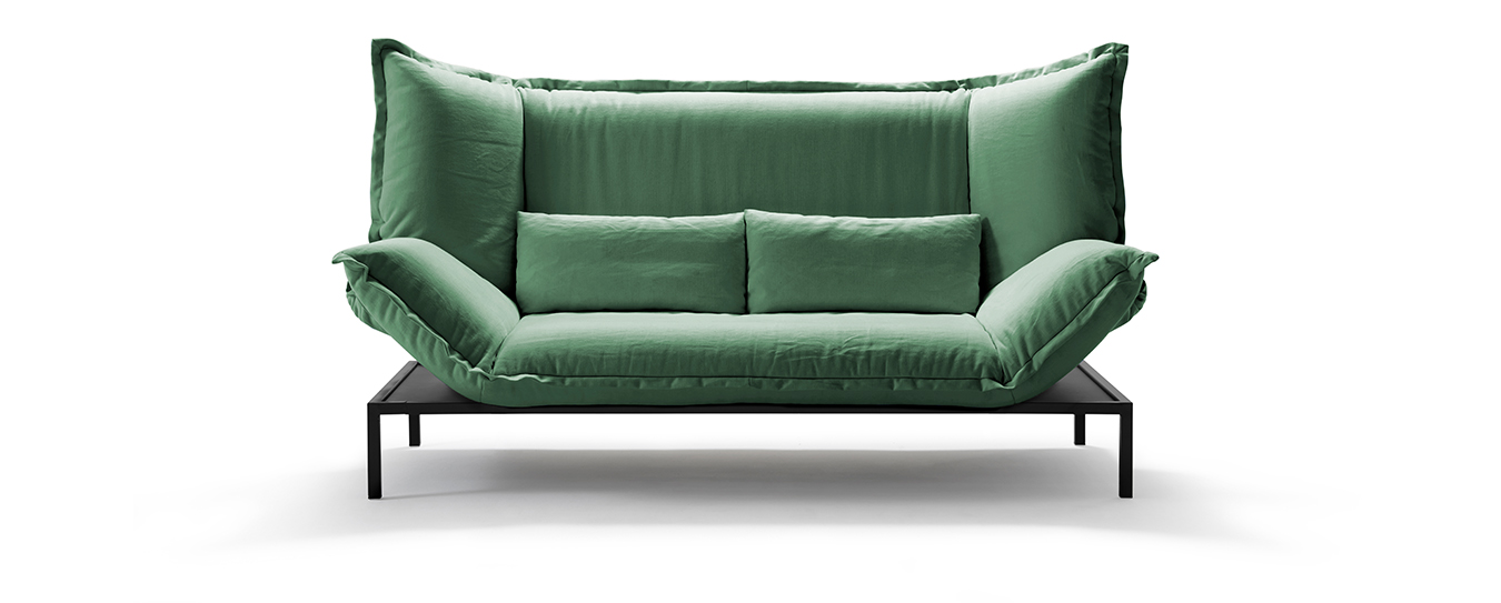 Das Schlafsofa Nuri von Signet im Stoff Lesa, Farbe grün. Schlafsofa Nuri Signet Stoff grün